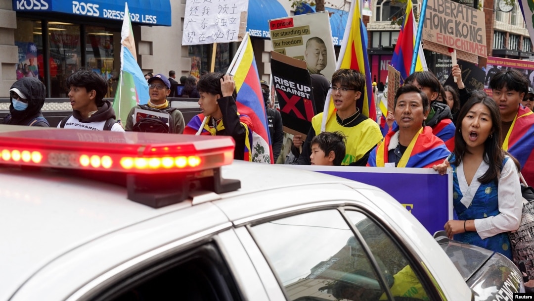People protest against Chinese President Xi Jinping during the Asia-Pacific Economic Cooperation summit in San Francisco, Nov. 15, 2023.