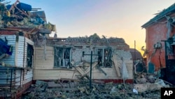 A damaged house remains after shelling by the Ukrainian side in the city of Sudzha, Kursk region, that borders Ukraine, Aug. 6, 2024. (Governor of Kursk region telegram channel via AP)