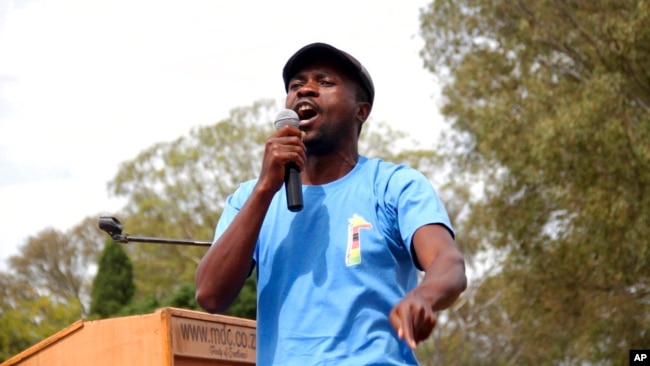 FILE - Itai Dzamara, an activist abducted by suspected state agents in 2015, addresses a gathering in Harare in March 6, 2015.