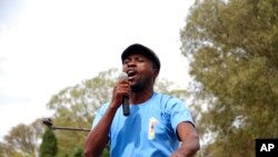 FILE - Itai Dzamara, an activist abducted by suspected state agents in 2015, addresses a gathering in Harare in March 6, 2015.