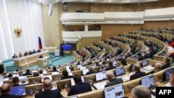 Majelis tinggi parlemen Rusia, Kamis (7/12) menetapkan 17 Maret 2024 sebagai tanggal pemilihan presiden berikutnya. (Foto oleh Handout / Dewan Federasi Rusia / AFP) 