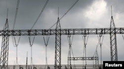 FILE - High-tension electrical power lines are seen at the Azura-Edo Independent Power Plant (IPP) on the outskirt of Benin City in Edo state, Nigeria on June 13, 2018. 