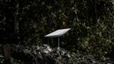 FILE - An antenna of the Starlink satellite-based broadband system donated by the U.S. tech billionaire Elon Musk is seen in Izyum, Kharkiv region, Sept. 25, 2022, amid Russia's invasion of Ukraine.