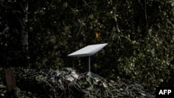 FILE - An antenna of the Starlink satellite-based broadband system donated by the U.S. tech billionaire Elon Musk is seen in Izyum, Kharkiv region, Sept. 25, 2022, amid Russia's invasion of Ukraine.