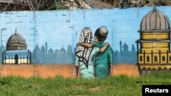 Mural u Johanesburgu u Južnoj Africi posvećen Palestincima i Izraelcima (Foto: Reuters/Esa Alexander)