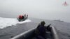 Participants sail boats during a joint Russian-Chinese naval exercise in the waters of the Sea of Japan, in this still image taken from video released by the Russian Defense Ministry July 20, 2023.