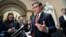 U.S. Speaker of the House Mike Johnson reads a statement to reporters about efforts to complete the appropriations process, at the Capitol in Washington, Jan. 12, 2024.