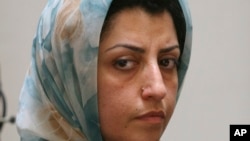 FILE - Iranian human rights activist Narges Mohammadi is pictured at a meeting on women's rights in Tehran, Iran, Aug. 27, 2007. Mohammadi led a hunger strike by Iranian dissidents Jan. 25, 2024, to protest a surge of hangings in Iran.