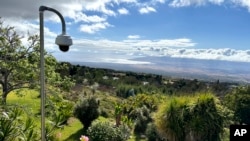 FILE - A fire-detection camera overlooks a neighborhood on July 18, 2024, in Kula, Hawaii. 