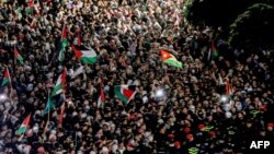 Demonstrators gather outside the Israeli Embassy in Amman, Jordan, Oct. 18, 2023 to show solidarity with the Palestinians of the Gaza Strip.