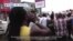 VOA60 Africa- Nigeria: Police fired tear gas to disperse crowds of protesters in the capital city of Abuja on Thursday
