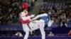 Hong Kong's Lo Wai Fung competes with Refugees Olympic Team's Yahya Al Ghotany in a men's 68kg Taekwondo match during the 2024 Summer Olympics, at the Grand Palais, Aug. 8, 2024, in Paris, France.