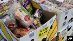 Recovered food is prepared to be distributed at a mobile food bank at Feeding Westchester in Elmsford, NY, Nov. 15, 2023.