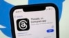 Aplikasi media sosial 'Threads' di App Store AS, Selasa, 4 Juli 2023. Meta siap meluncurkan aplikasi baru yang tampaknya meniru Twitter di tantangan langsung ke platform media sosial milik miliarder Elon Musk. (Christoph Dernbach/dpa via AP)