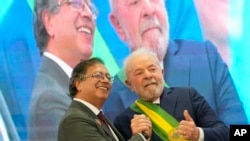 FILE - President Luiz Inacio Lula da Silva, right, poses for a picture with Colombia's President Gustavo Petro, at the Planalto Palace, in Brasilia, Brazil, Jan. 1, 2023.