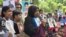 People gather on the International Day of the Victims of Enforced Disappearances in Dhaka, Bangladesh, while carrying photos of loved ones who were allegedly abducted by security agencies and who became victims of enforced disappearance, Aug. 1, 2024. (Mosfiqur Johan/VOA)
