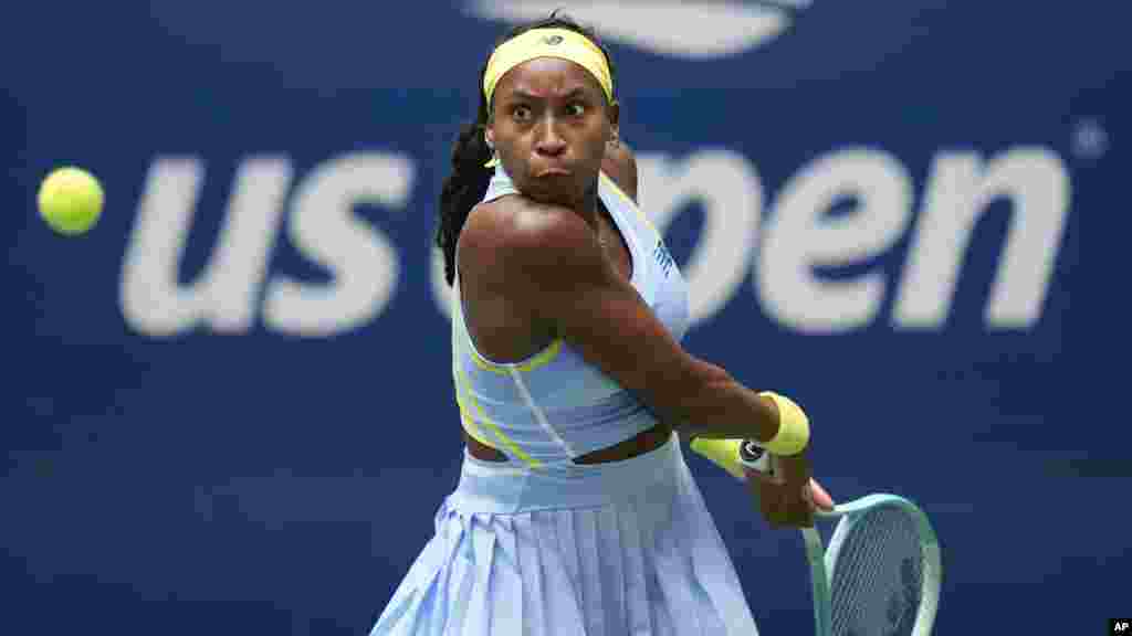 Coco Gauff of the United States returns a shot to Elina Svitolina of Ukraine during the third round of the U.S. Open tennis championships in New York. 