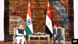 Egyptian President Abdel-Fattah el-Sissi, right, meets with India Prime Minister Narendra Modi in Cairo, Egypt, June 25, 2023.