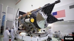 NASA’s Psyche spacecraft is shown in a clean room at the Astrotech Space Operations facility near the agency’s Kennedy Space Center in Florida on Dec. 8, 2022. (NASA/Ben Smegelsky)