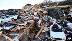 Debris covers the area around homes destroyed in the West Creek Farms neighborhood, Dec. 10, 2023, Clarksville, Tennessee.