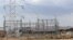 FILE - Power lines connecting pylons of high-tension electricity are seen from a power substation in Marsabit county, northern Kenya, Sept. 4, 2018. A nationwide power blackout hit Kenya Dec. 10 in the evening hours.