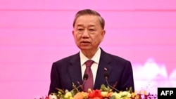 FILE- General Secretary of the Communist Party of Vietnam and President To Lam speaks during a press conference at the National Convention Center in Hanoi on Aug. 3, 2024.