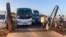 FILE: Buses carrying Sudanese, who fled the fighting in Sudan's capital, are leaving a ferry that transported to Egypt's southern city of Abu Simbel, May 7, 2023.