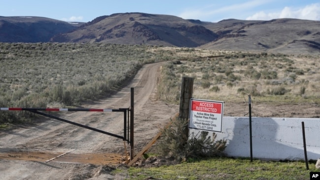 FILE - An 'Access Restricted' sign is displayed at the Lithium Nevada Corp. mine site at Thacker Pass on April 24, 2023, near Orovada, Nev.