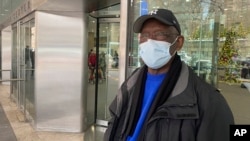 Taikwan Wright waits outside while his nephew is treated for asthma in the ICU in Bellevue Hospital in New York on Jan. 3, 2024.