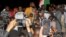 Kemi Seba, a Franco-Beninese firebrand pro-Russia activist, speaks to supporters of the junta that seized power in Niger in July, during a rally near the French military base, calling for the withdrawal of French forces, in Niamey, Niger, Sept. 28,2023.