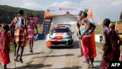French rally team of driver Sebastian Ogier and his co-driver Vincent Landais arrive&nbsp;in their Toyota Gr Yaris Rally1 Hybrid to pomp at the finish line to win the WRC Safari Rally Kenya, part of the FIA World Rally Championship at the lake-side town of Naivasha.