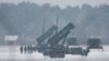 FILE - Patriot missile launchers acquired from the U.S. last year are seen deployed in Warsaw, Poland, Feb. 6, 2023. 