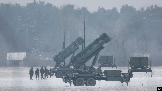 FILE - Patriot missile launchers acquired from the U.S. last year are seen deployed in Warsaw, Poland, Feb. 6, 2023.