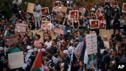 Protesters gather during a pro-Palestinian demonstration demanding a cease-fire, Oct. 28, 2023, in New York.