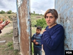 Ani Aloyan, 37, lives near the Armenian border with Azebaijan and fears there will be renewed war in her village, in Ishkhanasar, Armenia, Oct. 2, 2023. (Heather Murdock/VOA)
