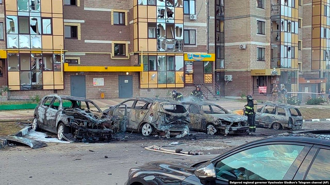 Firefighters extinguish burning cars in the courtyard of an apartment building after a missile attack by the Armed Forces of Ukraine on the city of Belgorod, Russia, Sept. 2, 2024.