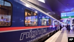 FILE - This image released by ÖBB shows a Nightjet sleeper train at a station in Vienna, Austria. 