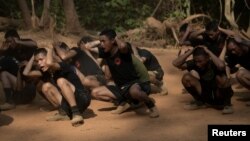 FILE - New recruits of the Bamar People's Liberation Army (BPLA) are seen during a training session at a camp in the Karen National Liberation Army (KNLA) territory in Karen State, Myanmar, March 6, 2024.