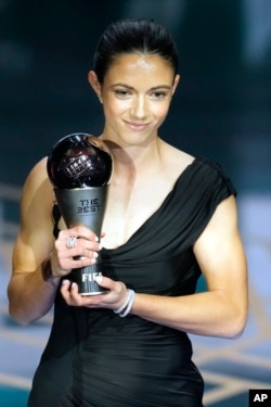 Barcelona's and Spain's Aitana Bonmati accepts the award for best women's player during the FIFA Football Awards 2023 at the Eventim Apollo in Hammersmith, London, Jan. 15, 2024.