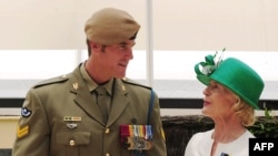 FILE — This handout photo taken and released by Australia’s Department of Defense on Jan. 23, 2011 shows Australia’s Governor-General Quentin Bryce talking to Corporal Ben Roberts-Smith after awarding him the Victoria Cross.