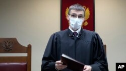 Russian Supreme Court judge Oleg Nefedov leads a hearing in the Russian Supreme Court in Moscow, Nov. 30, 2023. Russia's Supreme Court effectively outlawed LGBTQ+ activism, the most drastic step against advocates of gay, lesbian and transgender rights.