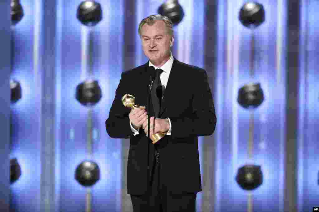 This image released by CBS shows Christopher Nolan accepting the award for best director for &quot;Oppenheimer&quot; during the 81st Annual Golden Globe Awards in Beverly Hills, Calif., on Jan. 7, 2024.