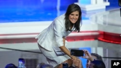 Republican presidential candidate former U.N. Ambassador Nikki Haley greets people after the Republican presidential primary debate hosted by NBC News, Nov. 8, 2023, in Miami.