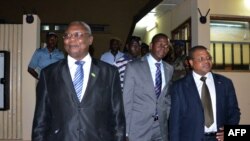 FILE—Central Africa's leading opposition figure Martin Ziguele (L), Centrafrican lawyers Crepin Mboli-Goumba (C) and Nicolas Tiangaye (R) arrive in Bangui on January 15, 2013. 