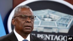 FILE — U.S. Secretary of Defense Lloyd Austin speaks at the Pentagon in Washington, July 18, 2023. In a statement on Saturday, he took "full responsibility" for secrecy surrounding his hospitalization for an unspecified medical condition. 
