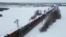 FILE - Trucks line up in a long queue to cross the Polish-Ukrainian border at the Dorohusk-Jagodzin crossing, in Brzezno, Poland, Dec. 4, 2023. 