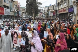 FILE - Relatives of missing Baloch community people take part in a demonstration demanding greater civil rights for citizens, in Quetta, Pakistan, on Aug. 18, 2024.