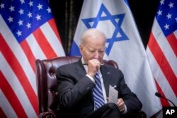 U.S. President Joe Biden pauses during a meeting with Israeli Prime Minister Benjamin Netanyahu to discuss the war between Israel and Hamas, in Tel Aviv, Israel, Oct. 18, 2023.
