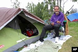 Shawn Steik poses for a photo, July, 26, 2023, in downtown Anchorage, Alaska.