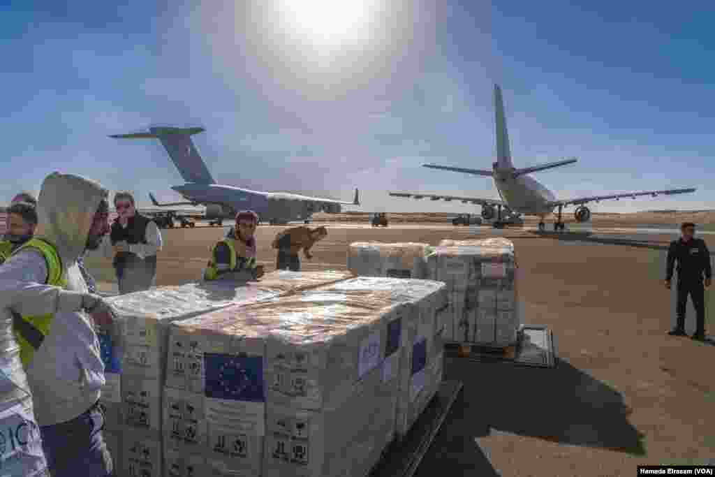 Aid flights from the Gulf states, the European Union, and the United Nations' migration agency are unloaded inside Al-Arish airport, near the Egypt-Gaza border. Al-Arish, Egypt, Nov. 29, 2023.